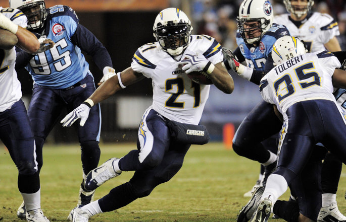 Former Los Angeles Chargers running back LaDainian Tomlinson runs with the football.