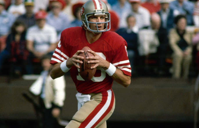 Former San Francisco 49ers quarterback Joe Montana passes the football.