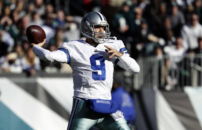 Former Dallas Cowboys quarterback Tony Romo passes the football.
